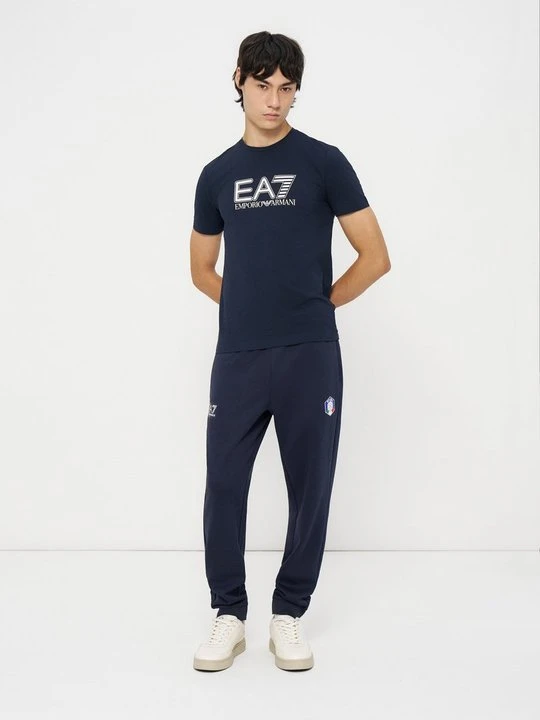 Zdjęcie produktu Spodnie treningowe EA7 Emporio Armani niebieski