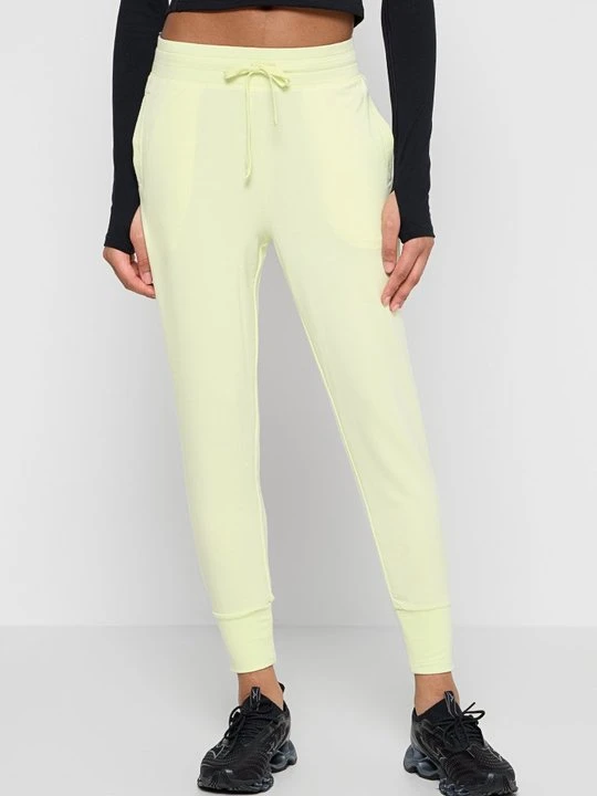 Zdjęcie produktu Spodnie treningowe Fabletics żółty