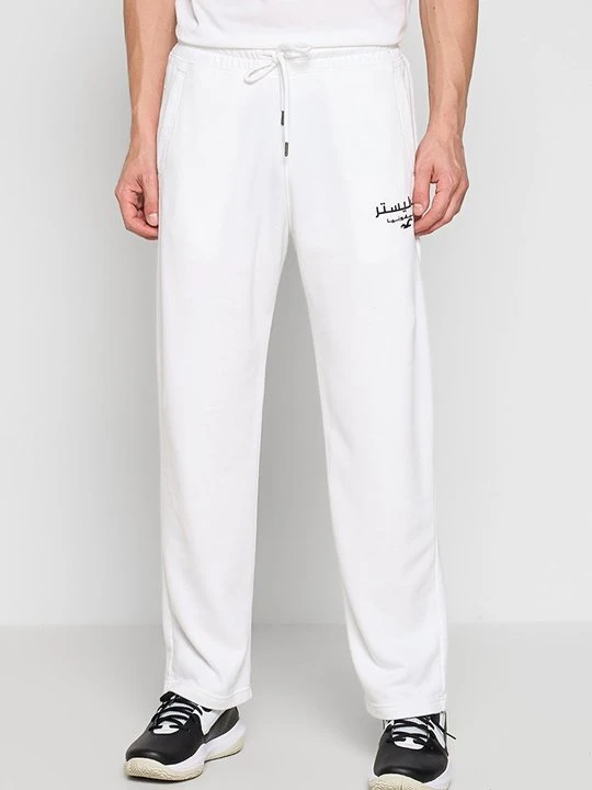 Zdjęcie produktu Spodnie treningowe Hollister Co. biały