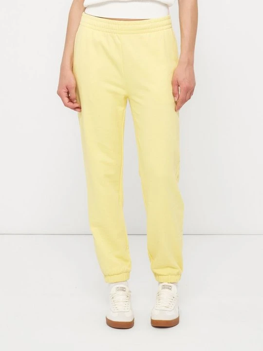 Zdjęcie produktu Spodnie treningowe Lacoste jasnożółty
