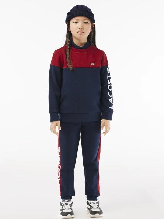 Zdjęcie produktu Spodnie treningowe Lacoste pomarańczowy