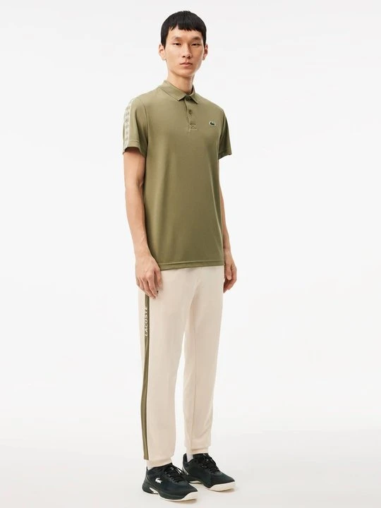 Zdjęcie produktu Spodnie treningowe Lacoste zielony