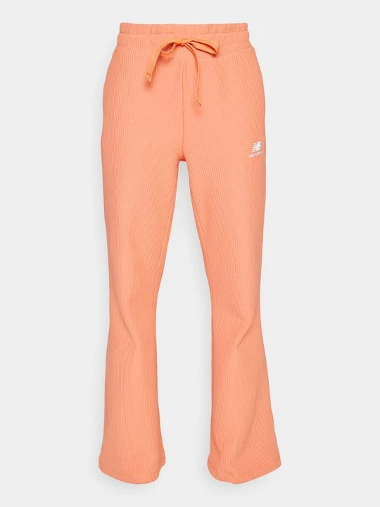 Zdjęcie produktu Spodnie treningowe New Balance pomarańczowy