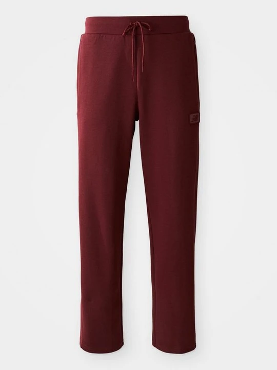 Zdjęcie produktu Spodnie treningowe New Balance bordowy