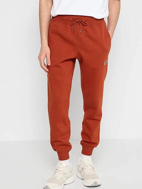 Zdjęcie produktu Spodnie treningowe New Balance czerwony