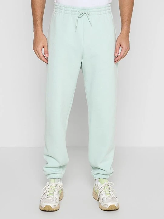 Zdjęcie produktu Spodnie treningowe New Balance jasnozielony
