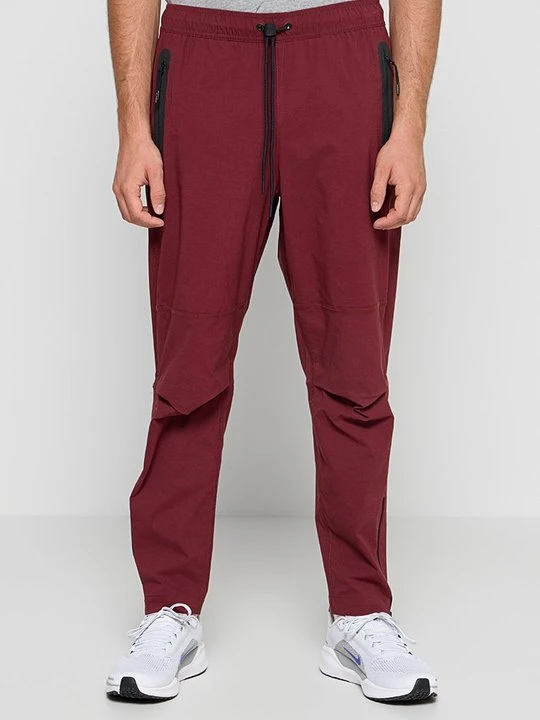 Zdjęcie produktu Spodnie treningowe Nike bordowy