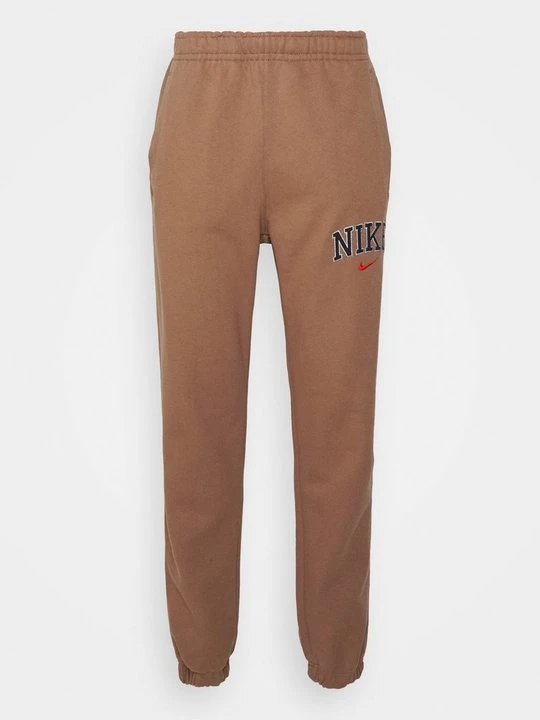 Zdjęcie produktu Spodnie treningowe Nike brązowy