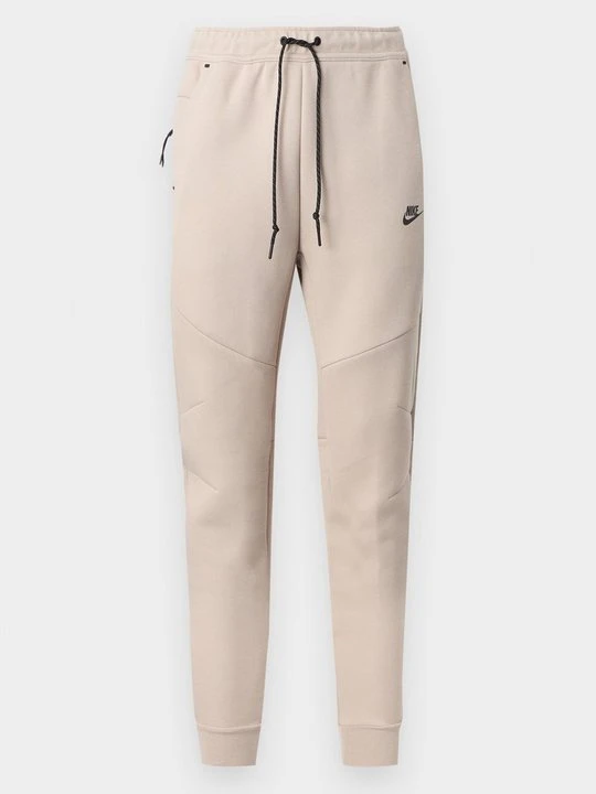 Zdjęcie produktu Spodnie treningowe Nike mleczny