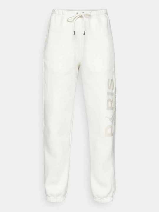 Zdjęcie produktu Spodnie treningowe Nike mleczny