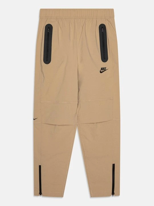 Zdjęcie produktu Spodnie treningowe Nike beżowy
