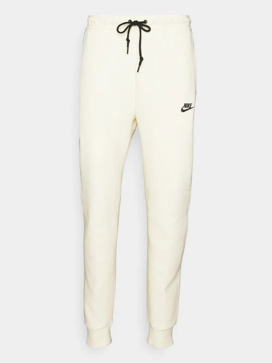Zdjęcie produktu Spodnie treningowe Nike mleczny