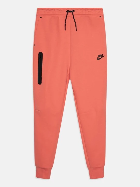 Zdjęcie produktu Spodnie treningowe Nike koralowy