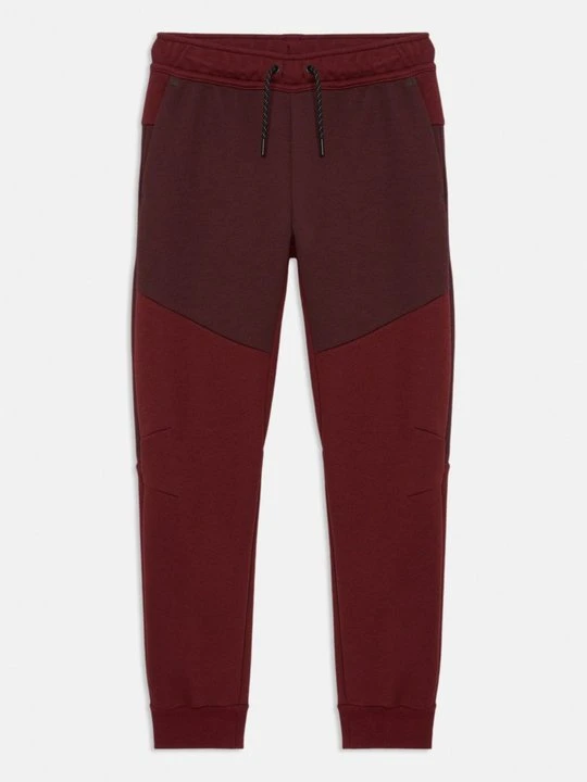 Zdjęcie produktu Spodnie treningowe Nike bordowy