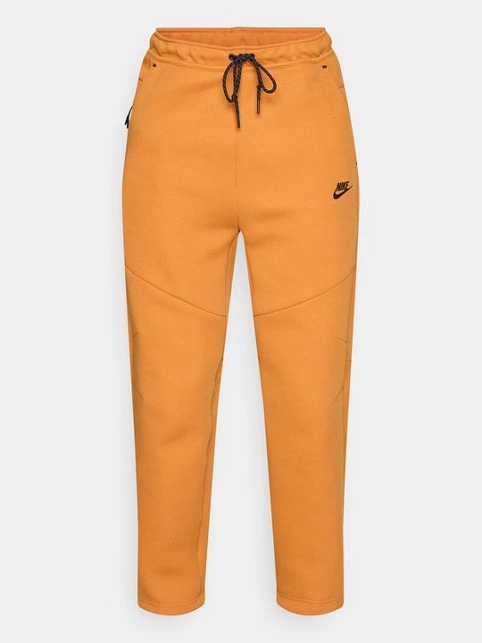 Zdjęcie produktu Spodnie treningowe Nike pomarańczowy