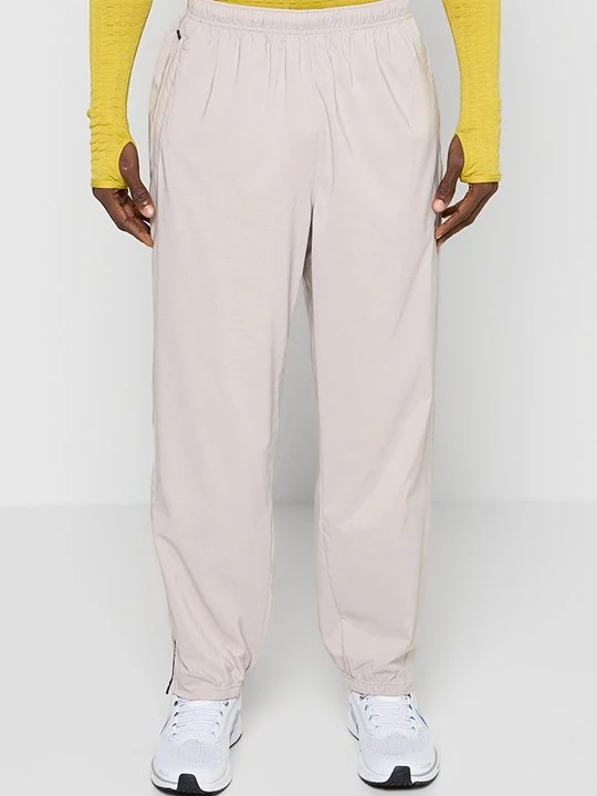 Zdjęcie produktu Spodnie treningowe Nike piaskowy