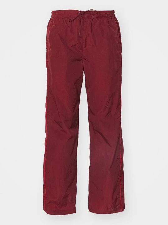 Zdjęcie produktu Spodnie treningowe Nike ciemnoczerwony