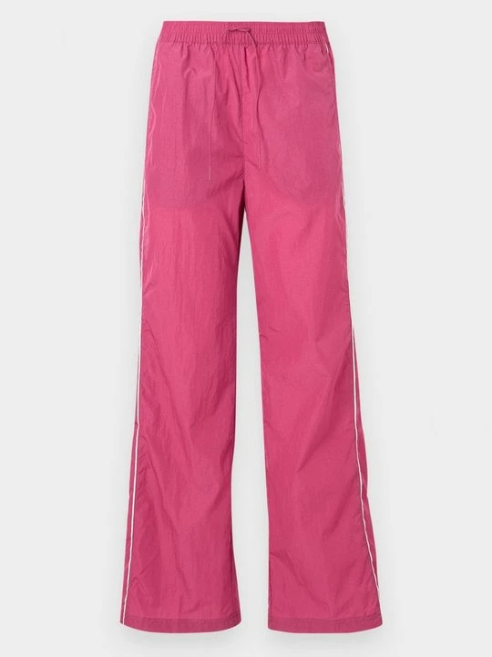 Zdjęcie produktu Spodnie treningowe Nike jagodowy