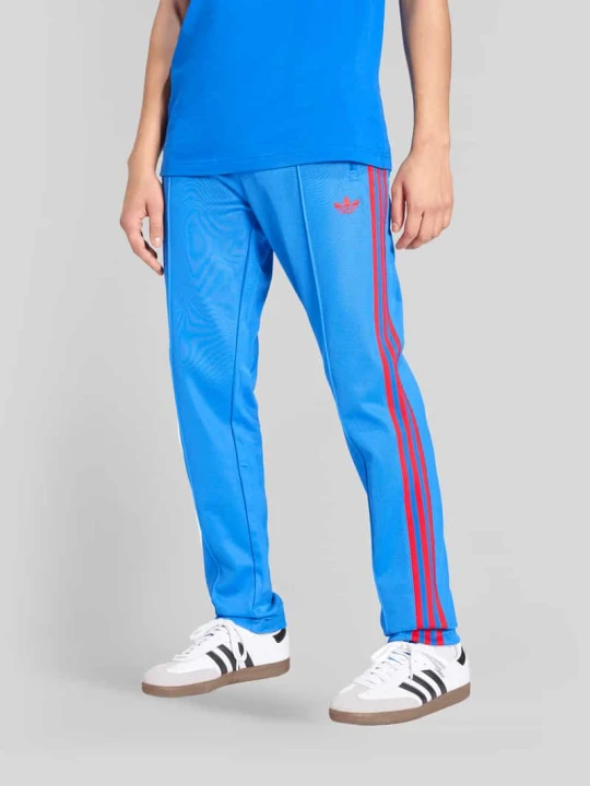 Zdjęcie produktu Spodnie treningowe o kroju regular fit, model 'CLASSIC' adidas Originals Królewski niebieski