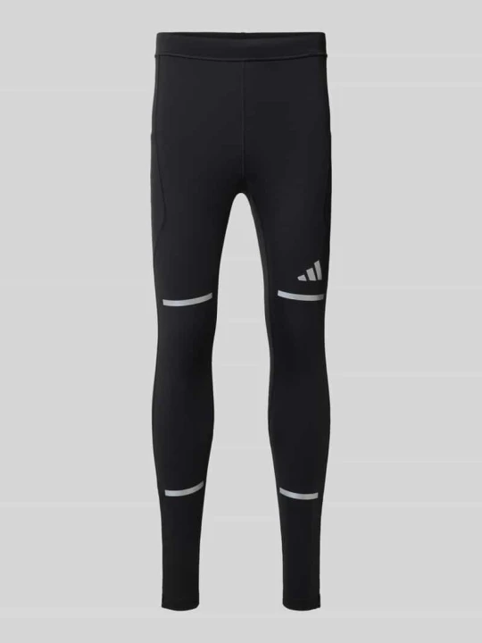 Zdjęcie produktu Spodnie treningowe o kroju slim fit z odblaskowymi detalami model 'adi' Adidas Czarny