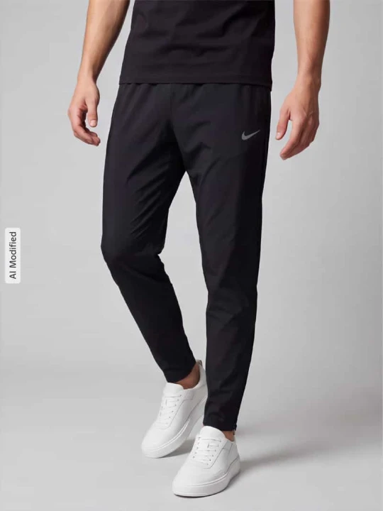 Zdjęcie produktu Spodnie treningowe o kroju slim fit z technologia dri-fit model 'Stride' Nike Czarny