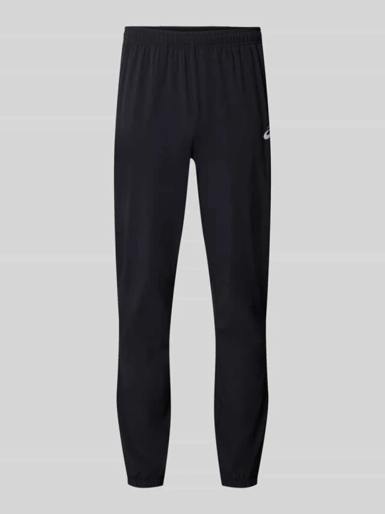 Zdjęcie produktu Spodnie treningowe o kroju straight fit z nadruk z logo model 'Core' Asics Czarny