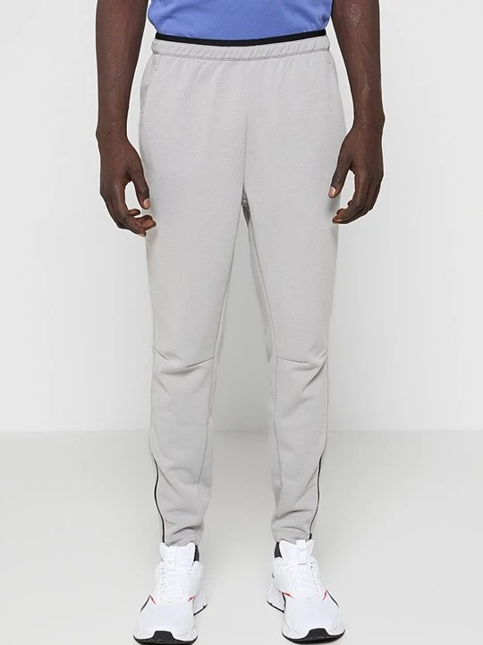 Zdjęcie produktu Spodnie treningowe Reebok szary