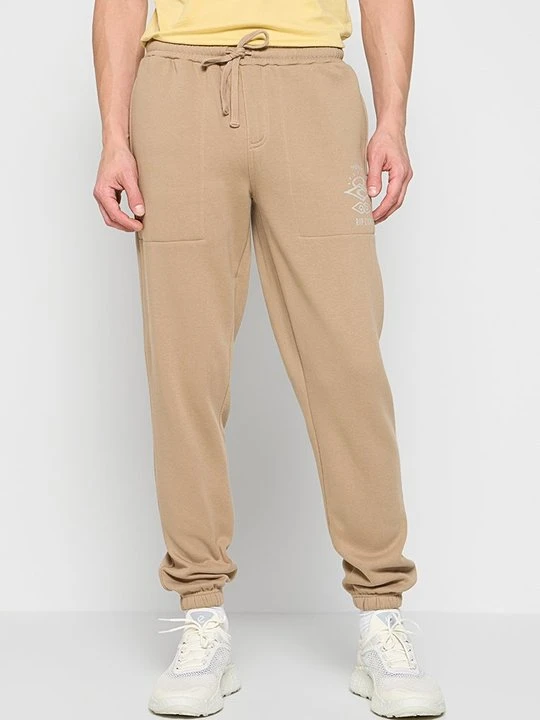 Zdjęcie produktu Spodnie treningowe Rip Curl piaskowy