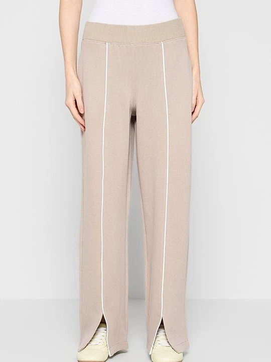 Zdjęcie produktu Spodnie treningowe SPANX beżowy