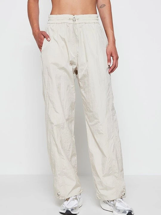 Zdjęcie produktu Spodnie treningowe Sweaty Betty mleczny