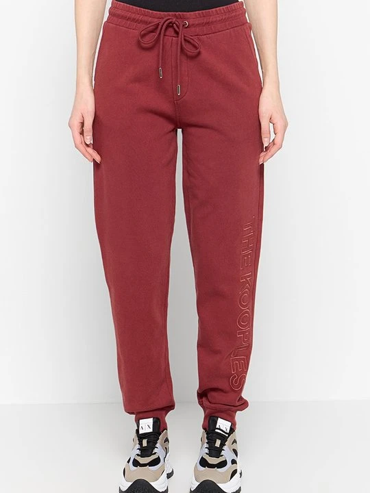 Zdjęcie produktu Spodnie treningowe The Kooples bordowy