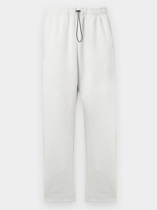 Zdjęcie produktu Spodnie treningowe The Tracksuit Club szary