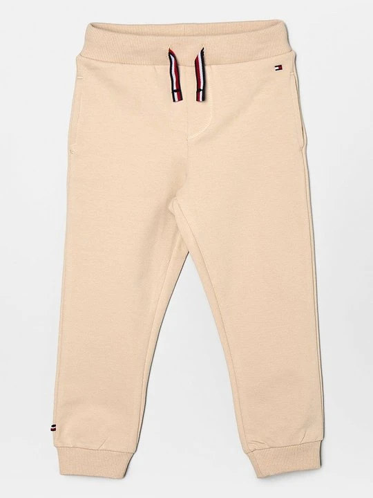 Zdjęcie produktu Spodnie treningowe Tommy Hilfiger piaskowy