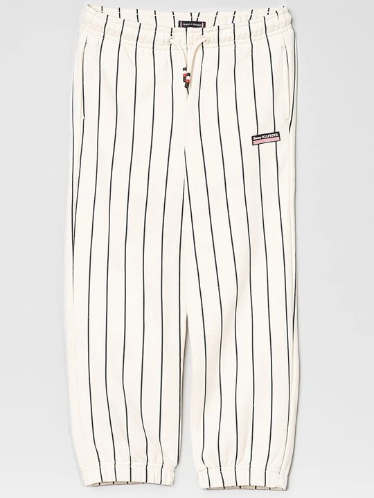 Zdjęcie produktu Spodnie treningowe Tommy Hilfiger beżowy