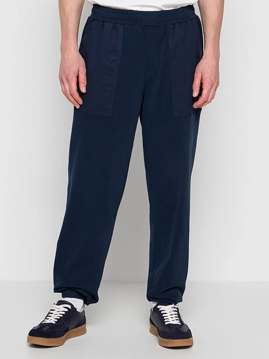 Zdjęcie produktu Spodnie treningowe Tommy Hilfiger granatowy