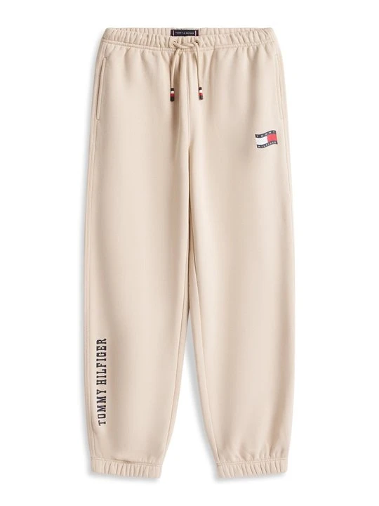 Zdjęcie produktu Spodnie treningowe Tommy Hilfiger beżowy