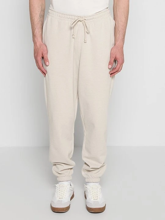 Zdjęcie produktu Spodnie treningowe Tommy Jeans beżowy