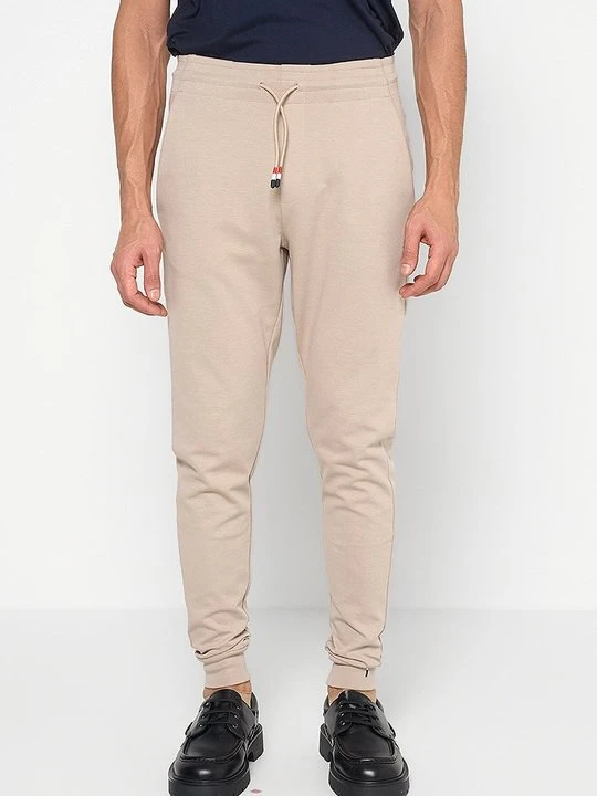 Zdjęcie produktu Spodnie treningowe U.S. POLO ASSN. beżowy