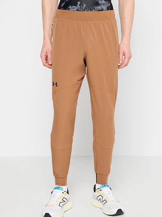 Zdjęcie produktu Spodnie treningowe Under Armour ochra