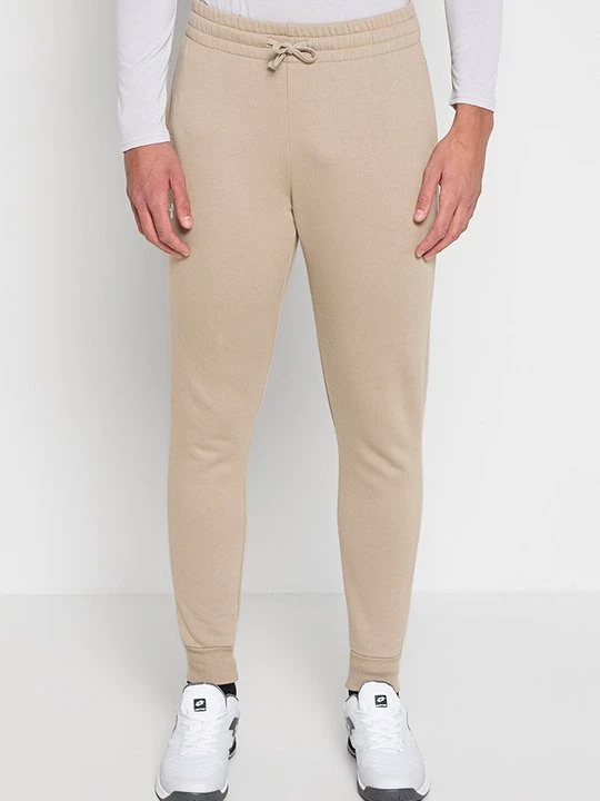 Zdjęcie produktu Spodnie treningowe Under Armour beżowy
