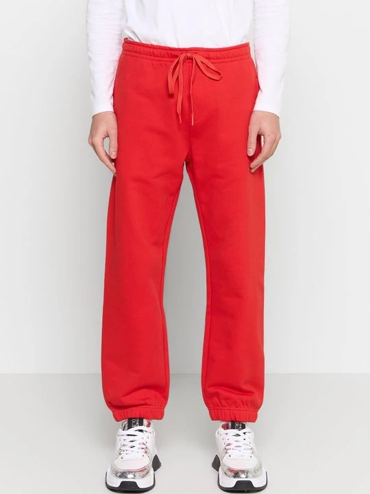 Zdjęcie produktu Spodnie treningowe Versace Jeans Couture czerwony