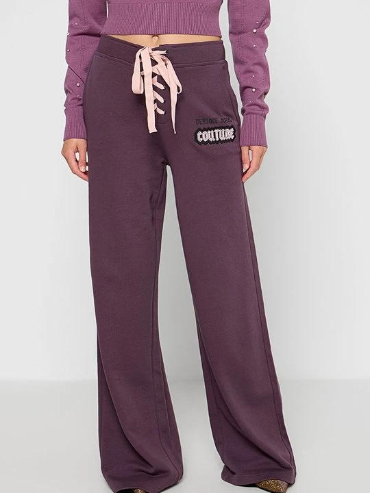 Zdjęcie produktu Spodnie treningowe Versace Jeans Couture liliowy
