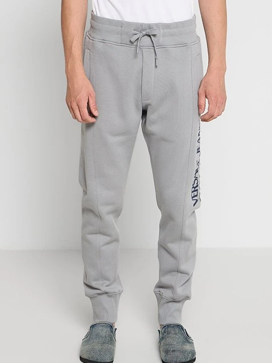 Zdjęcie produktu Spodnie treningowe Versace Jeans Couture szary