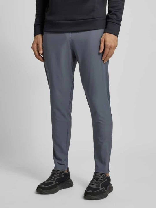 Zdjęcie produktu Spodnie treningowe z kieszeniami zapinanymi na zamek błyskawiczny Under Armour Antracytowy