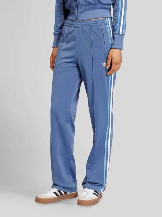 Zdjęcie produktu Spodnie treningowe z wyhaftowanym logo adidas Originals Niebieski