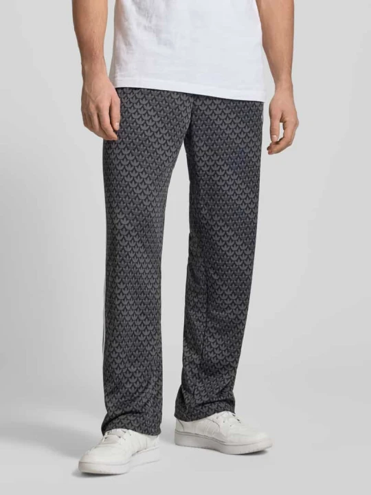 Zdjęcie produktu Spodnie treningowe z Wzór z logo adidas Originals Czarny