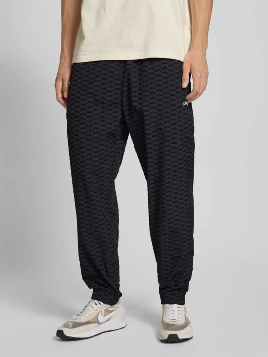 Zdjęcie produktu Spodnie typu track pants o kroju relaxed fit z wyhaftowanym logo BLKVIS Czarny