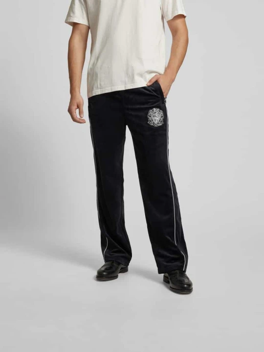 Zdjęcie produktu Spodnie typu track pants o rozkloszowanym kroju z kieszenią z tyłu Billionaire Boys Club Czarny