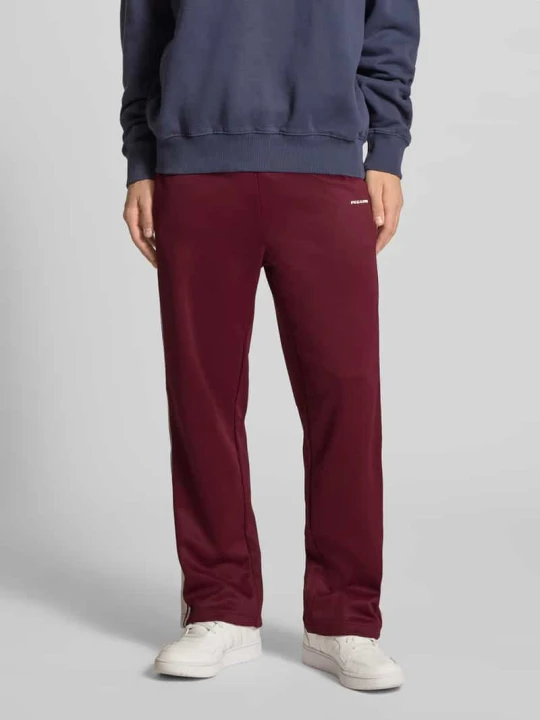 Zdjęcie produktu Spodnie typu track pants o szerokim kroju z aplikacją logo model ‘Viro’ Pegador Bordowy