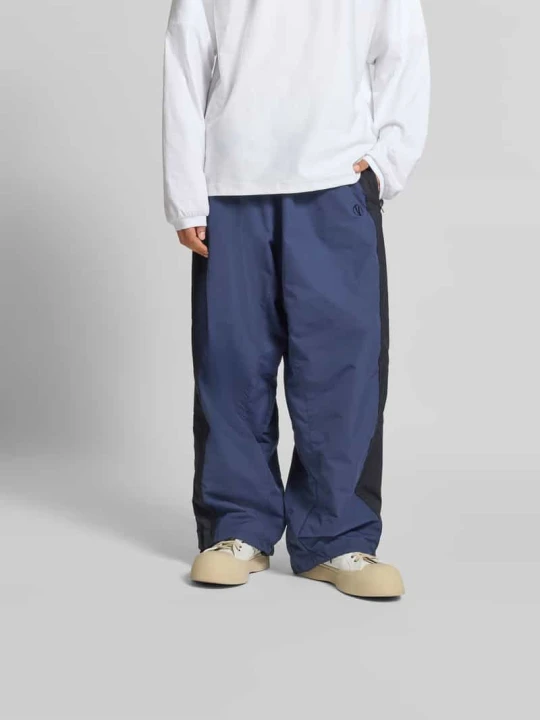 Zdjęcie produktu Spodnie typu track pants o szerokim kroju z elastycznym pasem Vetements Granatowy